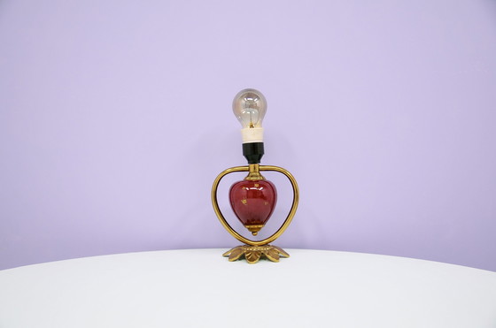 Image 1 of gold & red wall lamp