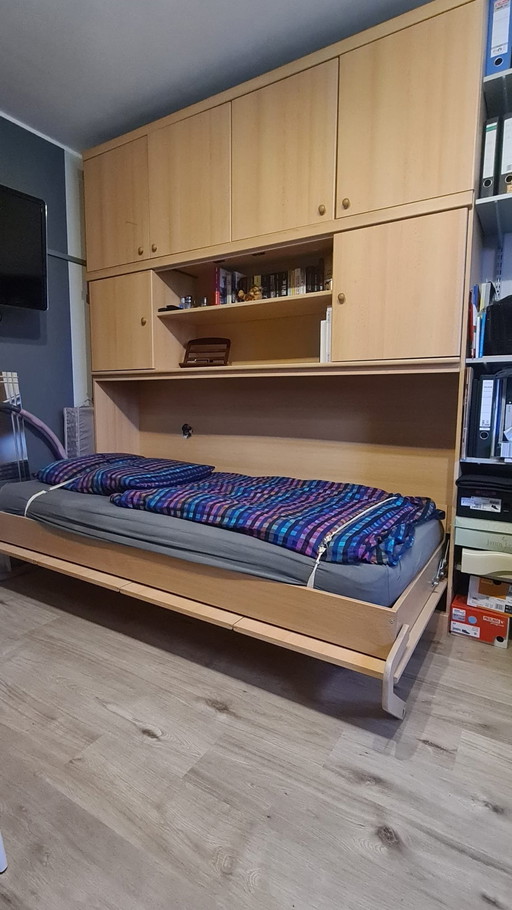 Folding wardrobe bed with lighting