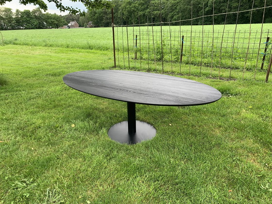 Image 1 of Bodilson Oval Black Wooden Dining Table