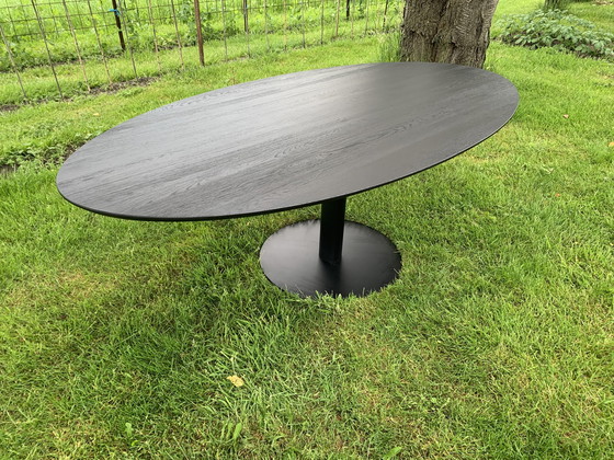 Image 1 of Bodilson Oval Black Wooden Dining Table