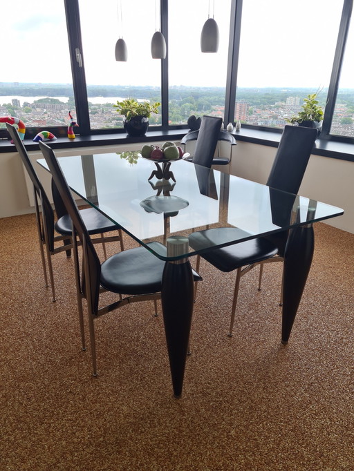 Glass dining table with 5x Fasem 44 chairs