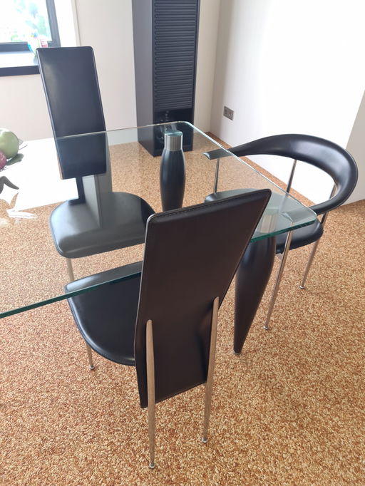 Glass dining table with 5x Fasem 44 chairs