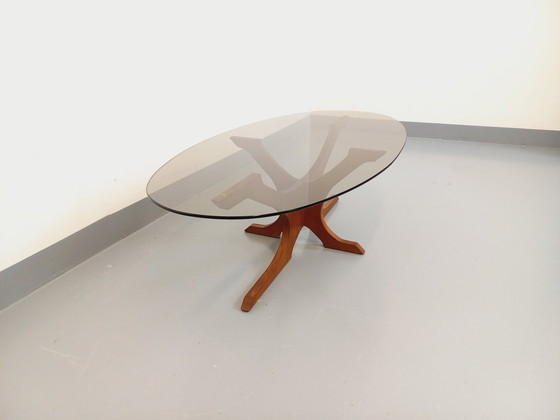 Image 1 of Hugues Poignant Vintage Oval Coffee Table in Teak and Smoked Glass from the 60s and 70s