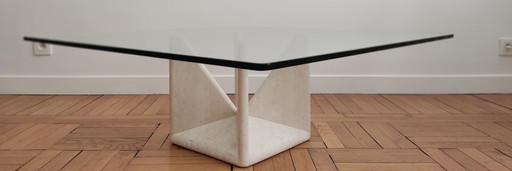 Sculptural travertine & glass coffee table