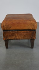 Hocker vintage en cuir de mouton