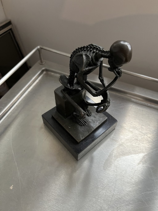 The Thinker figurine