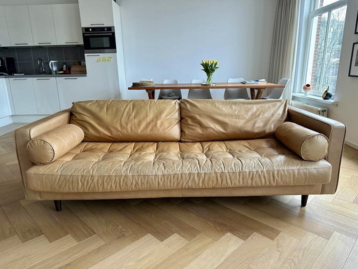 Upholstered leather sofa Article