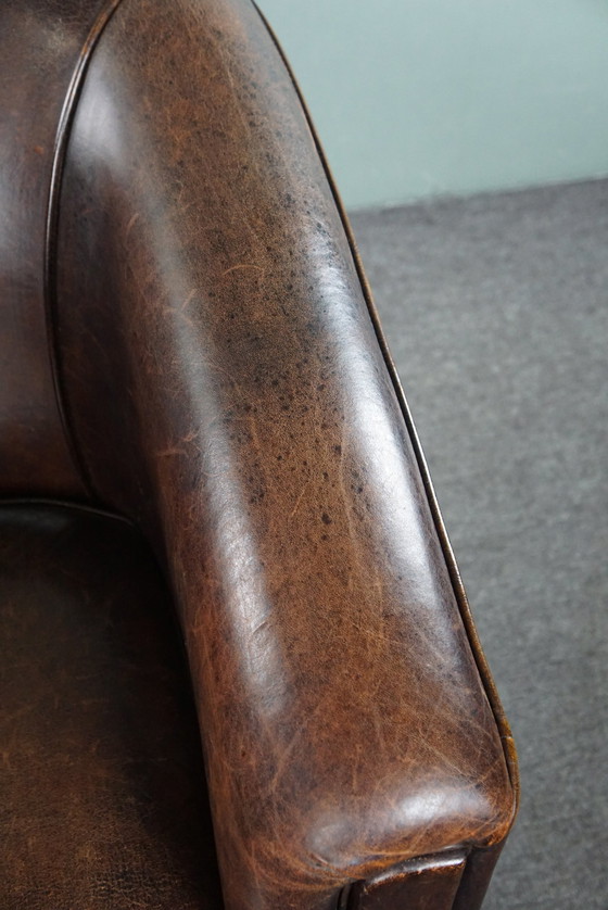 Image 1 of Dark sheep leather club chair, sleek design