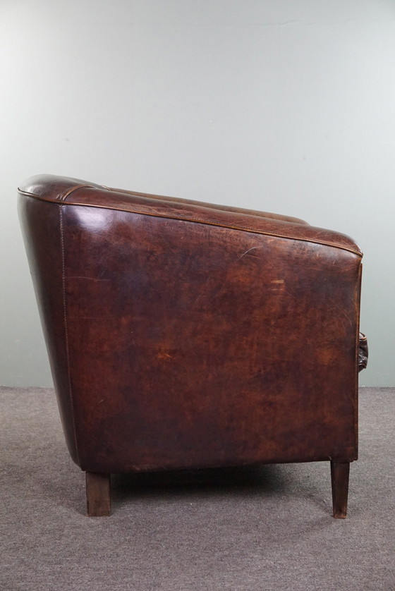 Image 1 of Dark sheep leather club chair, sleek design