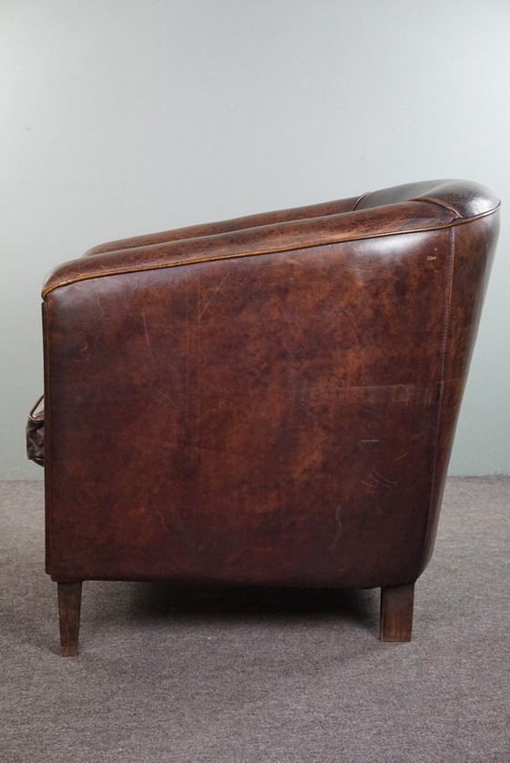 Image 1 of Dark sheep leather club chair, sleek design