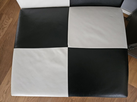 Image 1 of Hilberts black and white chair leather