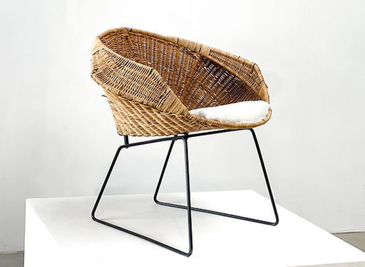 Rattan and bouclé easy chair