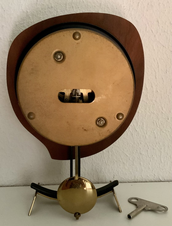 Image 1 of Orfac table clock with pendulum and key