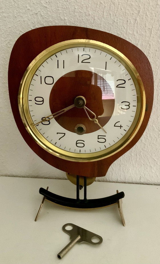 Image 1 of Orfac table clock with pendulum and key