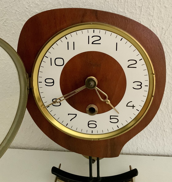 Image 1 of Orfac table clock with pendulum and key