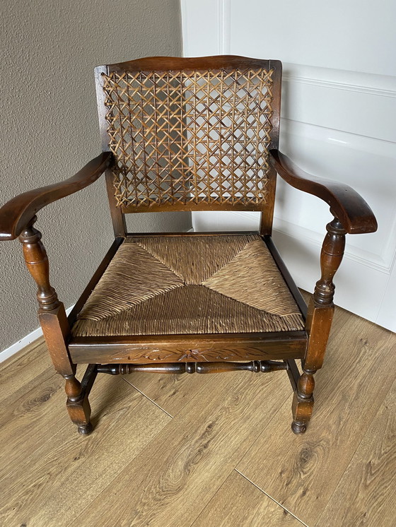 Image 1 of Sedia antica in legno con stuoia e cinghie 