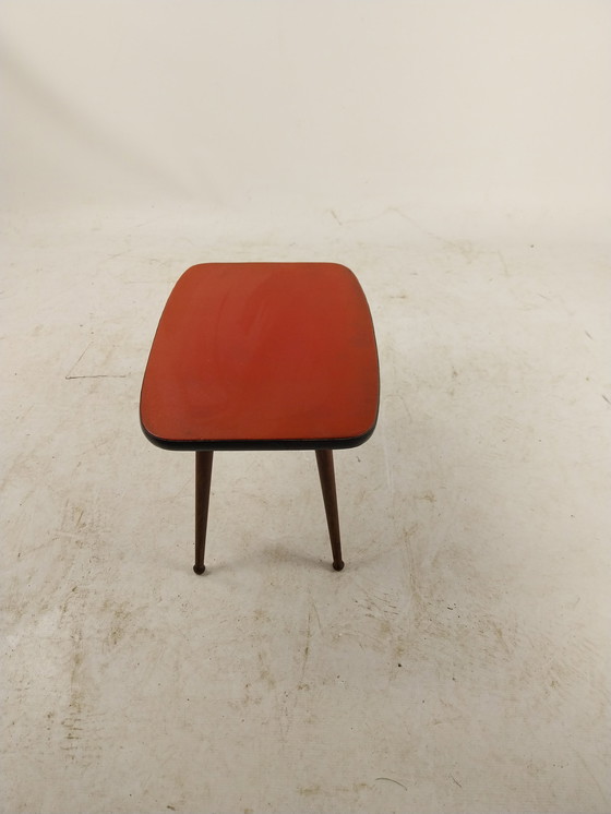 Image 1 of 1 x plant table in red vinyl with beautifully shaped legs