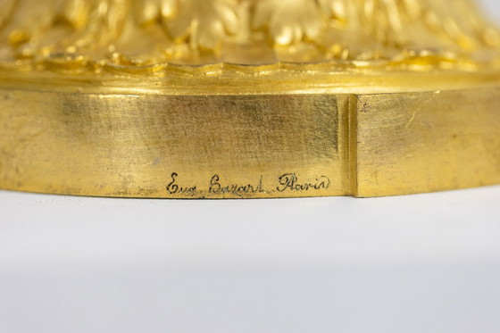 Image 1 of Lámpara de pie de diseño en acero cepillado y latón. Obra francesa. Hacia 1940.