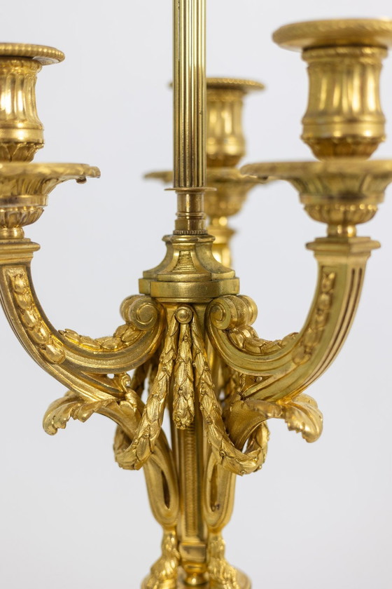 Image 1 of Lámpara de pie de diseño en acero cepillado y latón. Obra francesa. Hacia 1940.