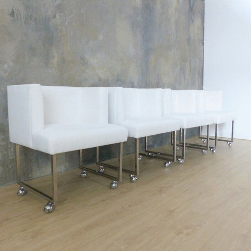 Set of 4 vintage white armchairs on casters, 1960