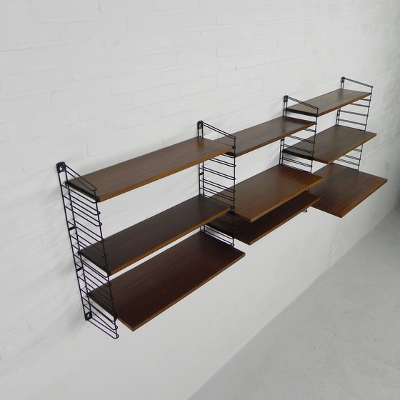 Image 1 of 3 PIECE TOMADO WALL RACK, BOOK RACK WITH 4 STEEL FRAMES AND 9 TEAK SHELVES