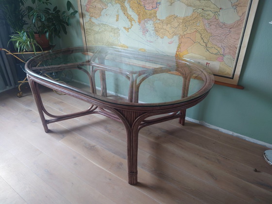 Image 1 of Bamboo dining table with glass top