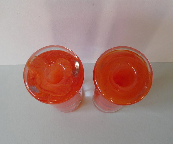 Image 1 of 2 Orange candlesticks Atoll swirl, design Anna Ehrner, Kosta Boda, Sweden