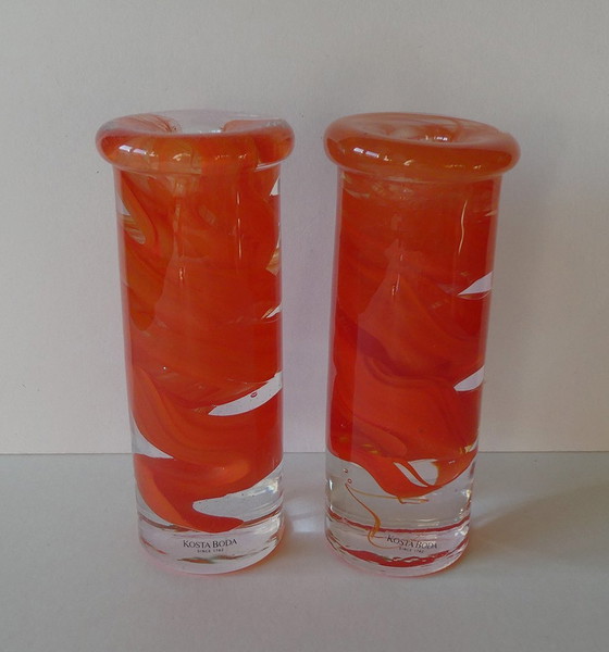 Image 1 of 2 Orange candlesticks Atoll swirl, design Anna Ehrner, Kosta Boda, Sweden