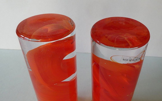 Image 1 of 2 Orange candlesticks Atoll swirl, design Anna Ehrner, Kosta Boda, Sweden