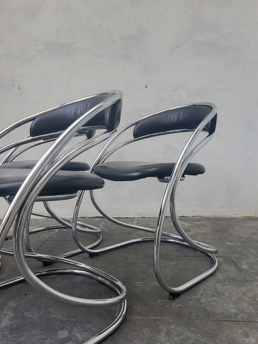 Space age chairs metal and skai leather