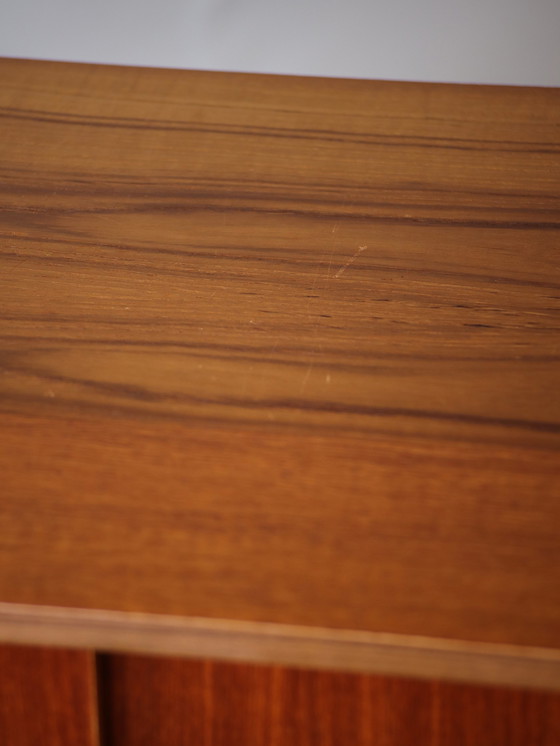 Image 1 of Mobiletto danese vintage in teak con ante scorrevoli