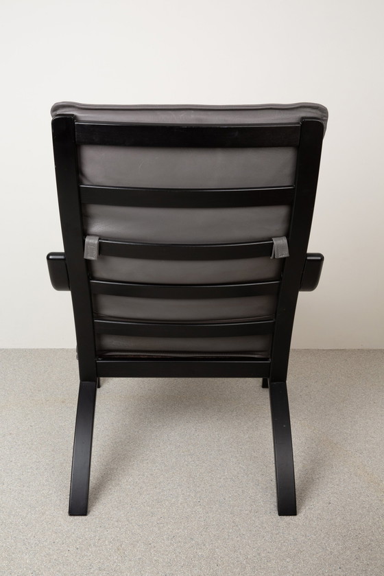 Image 1 of Poltrona vintage in pelle nera - Stouby 1970, modello Mimi | Design danese