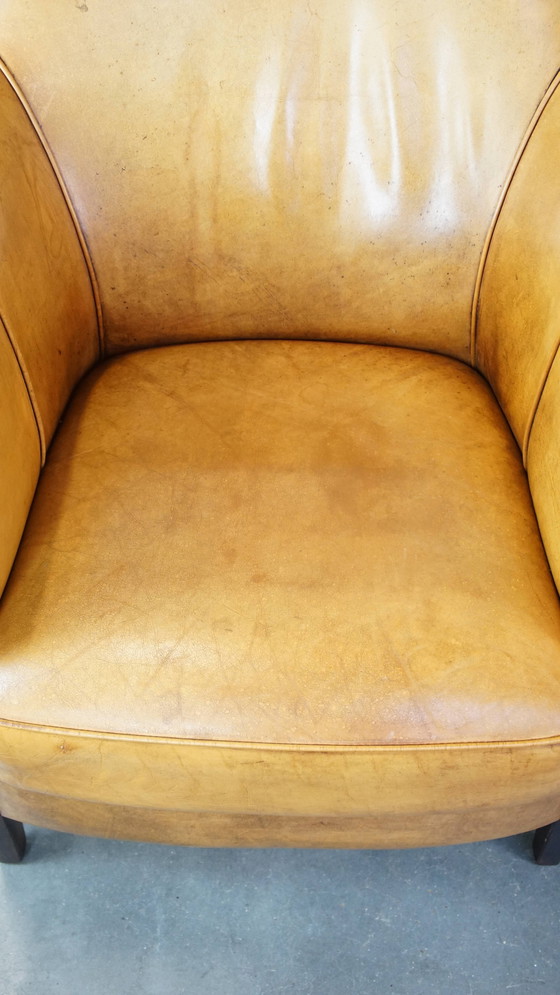 Image 1 of Beef Leather Armchair + Hocker