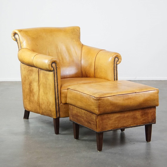 Image 1 of Beef Leather Armchair + Hocker