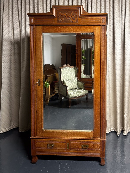 Closet Art Nouveau with clothes rail mirror door