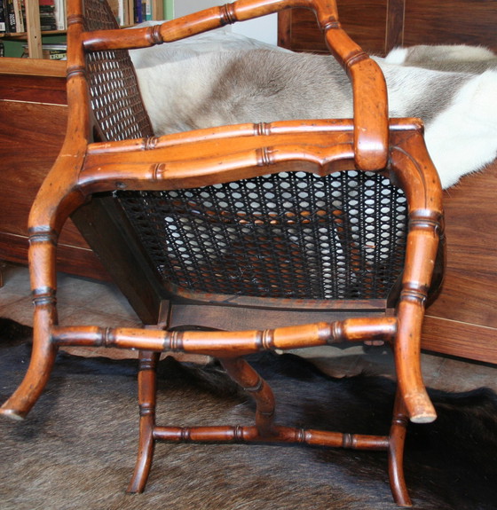 Image 1 of French Provincial faux bamboo wooden armchair