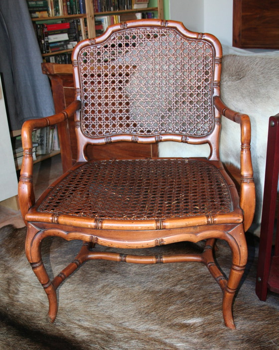 Image 1 of French Provincial faux bamboo wooden armchair