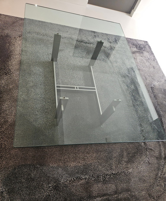 Image 1 of Table basse moderne en verre avec structure en acier inoxydable