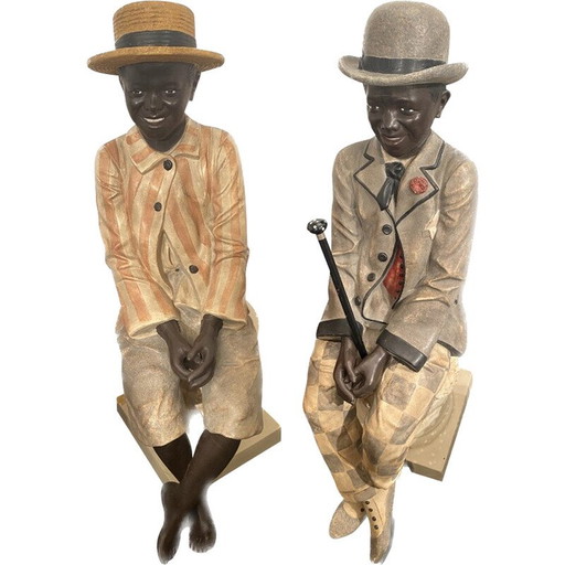 Pair of vintage statutes "The rich and the poor", 1975-1980s