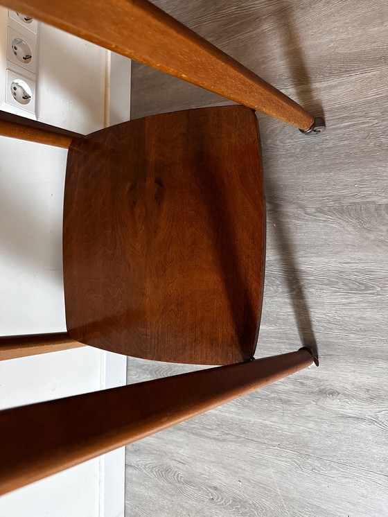 Image 1 of Side table with brass on wheels