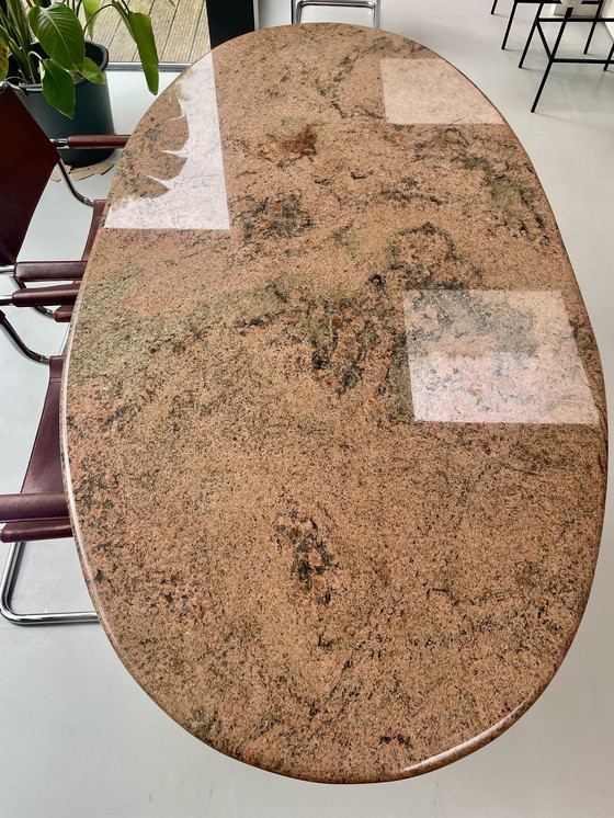 Image 1 of Pink Oval Granite Dining Table