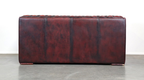 Image 1 of Red cowhide leather chesterfield 2 seater sofa