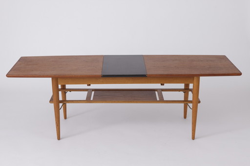 Danish extendable teak coffee table