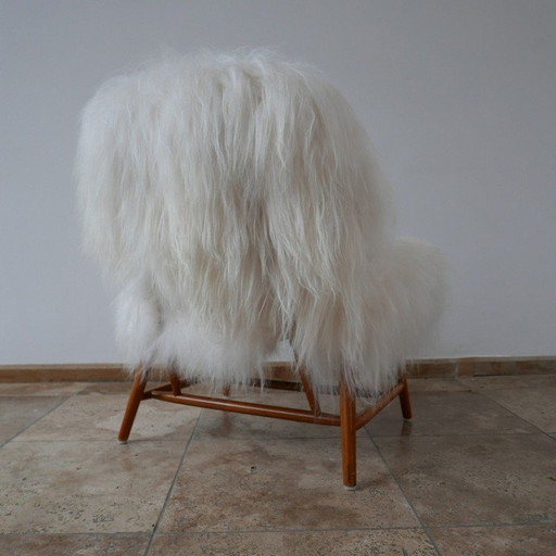 Vintage "TeVe" sheepskin chair by Alf Svensson for Studio Ljungs Industrier AB Malmö, Sweden 1950