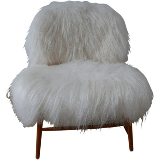 Vintage "TeVe" sheepskin chair by Alf Svensson for Studio Ljungs Industrier AB Malmö, Sweden 1950
