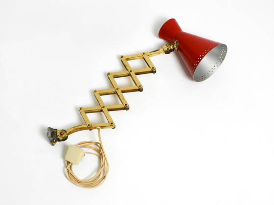 Image 1 of Original Mid Century Brass Extendable Scissor Wall Lamp With Aluminum Diabolo Shade In Red And Brass