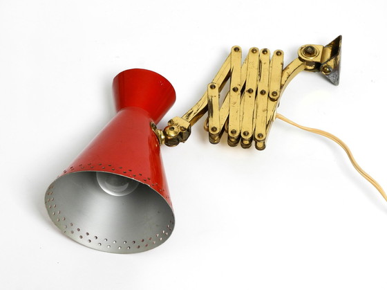 Image 1 of Original Mid Century Brass Extendable Scissor Wall Lamp With Aluminum Diabolo Shade In Red And Brass