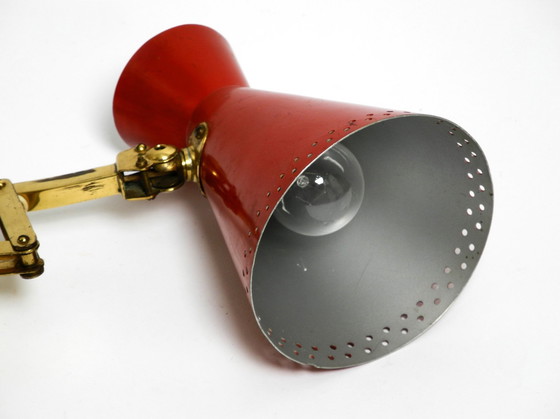 Image 1 of Original Mid Century Brass Extendable Scissor Wall Lamp With Aluminum Diabolo Shade In Red And Brass