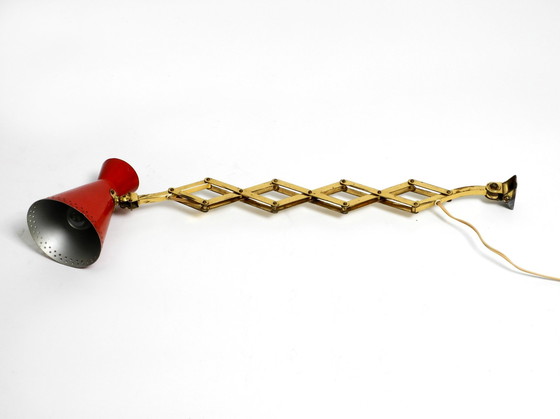 Image 1 of Original Mid Century Brass Extendable Scissor Wall Lamp With Aluminum Diabolo Shade In Red And Brass