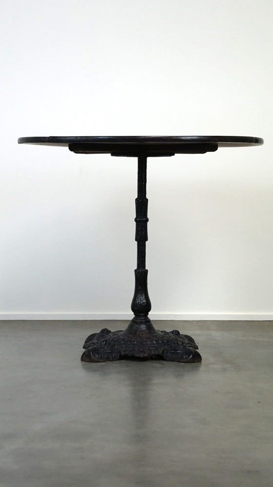 Image 1 of Round English pub table/ side table/ small dining table with cast iron leg and oak top